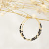 Goldene Creolen mit Miyuki Perlen in Schwarz und Gold