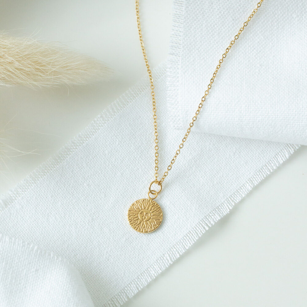 Goldene Gliederkette mit Sonnenanhänger